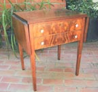 antique drop-leaf mahogany table